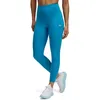 Image de Legging chevilles - UNDER ARMOUR - Motion - Séchage rapide - Extensible respirant - Poche latérale