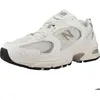 Image de Chaussure New Balance Modèle U530 - Coleur Blanc