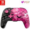 Image de Pdp - Manette Sans Fil Glow Pour Nintendo Switch Et Switch Oled - Grand Prix Peach - Noir Et Rose en occasion ou reconditionné