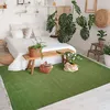 Image de Tapis en jute et coton avec franges vert foncé 120x170 - style bohème