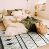Image de Tapis tout doux losanges beige et gris foncé 160x230