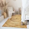 Image de Tapis en jute tressé main motif rond naturel 160x230