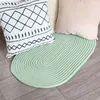 Image de Tapis en coton effet cordage vert basilic 50x80