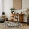 Image de Tapis rond aspect jute motifs en relief blanc diamètre 70