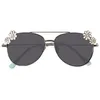 Image de Isotoner Lunettes de soleil pilote métallique avec marguerites argent fille