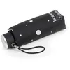 Image de Isotoner Parapluie compact solide ultra déperlant à ouverture manuelle technologie xtra-sec pois noir/jaune femme
