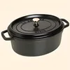 Image de Cocotte ovale en fonte - STAUB - 33 cm - 6.70 litres - Picots sous le couvercle - Noire