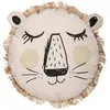 Image de Coussin rond lion franges 38 cm
