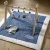 Image de Grand tapis de jeu en coton matelassé - PETIT NUAGE