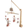Image de Mobile musical en bois avec jouets en coton - PETIT COEUR