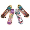 Image de Mini jouets Skateboard - PTIT CLOWN - re23490 - Lot de 4 - Multicolore - Pour enfants - Mixte