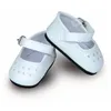 Image de Chaussures à bride blanches pour poupées - Petit Collin 603402 - Pour filles de 3 à 9 ans