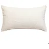 Image de Coussin bouclette Soana blanc ivoire 30x50cm - Atmosphera createur dinterieur