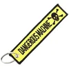 Image de CLJ - Porte-clés - DANGEROUS MACHINE - Jaune et Noir - Sécurité aviation - Urgence