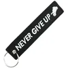 Image de CLJ - Porte-clés - NEVER GIVE UP - Noir et blanc - Métiers - Urgence