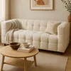 Image de IDMARKET Canapé droit 2 places capitonné AMANCE en tissu bouclette beige