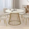 Image de IDMARKET Table à manger ronde YUNA 6 personnes pied filaire laiton et plateau effet marbre blanc ALASKA 110 cm