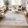 Image de tapis chambre 160x230 fait à la main gris et noir rectangle motif géométrique