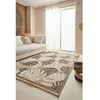 Image de Tapis intérieur extérieur aspect jute aux motifs feuilles - NAZAR RUGS - 160x230 cm - Nature - Noir