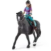 Image de Figurine Cavalière Lisa et Storm coffret schleich avec 10 éléments inclus dont 1 cheval schleich hanovrien et sa cavalière