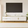 Image de Meuble TV - DREAMMESPACE - 175x40x45cm - 2 portes - 2 tiroirs - Marbre sculpté blanc et doré