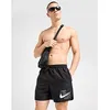 Image de Nike Short de bain Graphic - Noir, Noir S