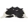Image de Tapis peau de vache en Cuir Noir et Blanc