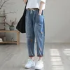 Image de Jean femme - trous déchirés - dessus plat - ample - droit - pantalon fin neuf points - poches - orange