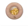Image de Donut sensoriel en bois - Citrons - PETIT BOUM - PBSDLEM - Beige - Bois de hêtre naturel - Dès 3 mois