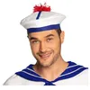 Image de Le béret marin en tissu est blanc bleu et noir avec un pompon rouge. Il completera parfaitement votre déguisement de marin à