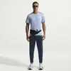 Image de Pantalon de jogging en maille Nike Stride Dri-Fit Bleu L