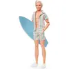 Image de Barbie The Movie Signature Poupée Ken avec planche de surf