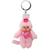 Image de Monchhichi, Unisexe, Porte-clés, Sekiguchi 242467 Fillette originale fleur de cerisier, en peluche rose, avec bavoir et tresse avec, Multicolore