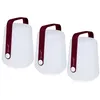Image de Lot De 3 Lampes Nomades Fermob Balad H 12 Cm - Cerise Noire