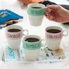 Image de Set de 4 mugs Vilaines Filles avec support