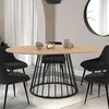 Image de IDMarket Table à manger extensible ronde yuna 6-8 personnes plateau bois et pied filaire en métal noir 110 - 150 cm
