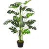Image de Arbre artificiel plante artificielle Monstera H. 100 cm tronc branches lichen feuilles de tortue grand réalisme pot inclus