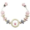 Image de Hochet rose de poussette avec clips bass & bass