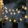 Image de Guirlande Lumineuse 3M LED avec 20 LED Flocon de neige pour Noël Soirée Maison Jardin, Blanc Chaud [Batterie alimenté]