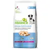 Image de Natural Trainer Puppy & Junior Medium poulet pour chiot - 12 kg