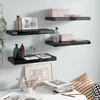Image de vidaXL ÃtagÃ¨re murale flottante 4 pcs Noir brillant 50x23x3,8 cm MDF