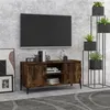 Image de vidaXL Meuble TV avec pieds en métal Chêne fumé 103,5x35x50 cm813161