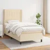 Image de Lit tapissier crÃ¨me, tÃªte rÃ©glable, matelas mousse + ressorts, soutien moyen-dur.