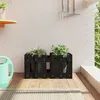 Image de vidaXL Jardinière avec design de clôture noir 60x30x30 cm pin massif832469