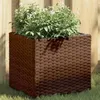 Image de vidaXL Jardinière marron 36x30x32 cm résine tressée366426