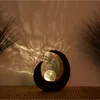 Image de Lampe solaire d'extérieur lumière décorative de patio demi-lune extérieur, brun noir, boule de verre, 1xLED 0,06W, LxlxH 29,x9x30,3 cm Nino 56010108