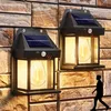 Image de Lampe Solaire Exterieur en Tungstène, 2 Packs Lampadaire Solaire Murale Rétro avec Détecteur de Mouvement, 3 Modes Applique Solaire IP65 Étanche pour