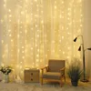 Image de Rideau led Lumineux 2x2M Lumière Chaude