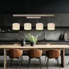 Image de Plafonnier suspendu réglable en hauteur pour salle à manger, poutres en bois rustique, abat-jour en tissu gris, métal noir, LxlxH 113x18x120 cm