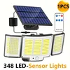 Image de Lampe Solaire Extérieur Détecteur de Mouvement, [3 Modes/348LED] Lumière Solaire Extérieure étanche IP65 éclairage Extérieur Solaire, Spot led avec